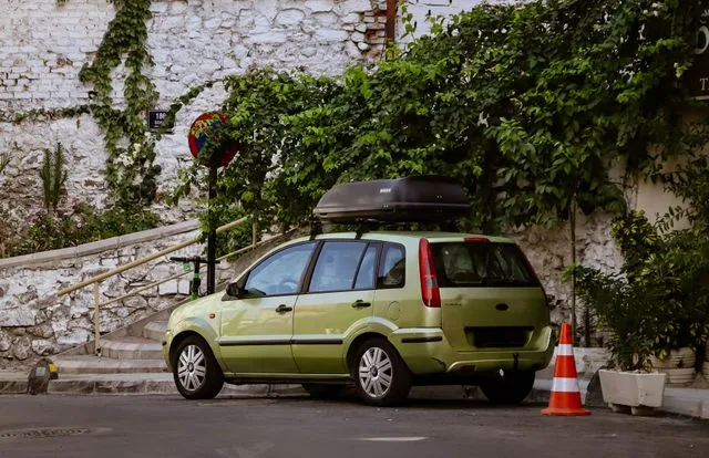 The Family Car Is Your Biggest Carbon Footprint. Here's What You Can Actually Do About It.